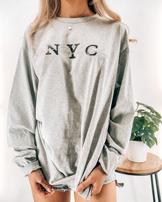 Your new favorite t-shirt is made with lots of care!  At your own home or when you stay comfortable, stay stylish and warm with this cozy crewneck sweatshirt. The crewneck is unisex, 100% cotton, and preshrunk. ✨SHIPPING✨ ∙ FREE SHIPPING FOR ALL ORDERS $100+ (in the U.S.) ∙ WORLDWIDE SHIPPING ∙ Orders are usually processed and shipped out in 5-7 business days, but in some cases, it may take up to 2 weeks. ✨DIMENSIONS✨ Reference the last photo for the size chart. ✨CARE INSTRUCTIONS✨ ∙ Wash inside-out ∙ Cold setting ∙ Hang to dry ∙ Avoid direct heat or iron * MORE FROM US * (Apparel, Jewelry, Tote Bags, Stickers, etc.) ➡️ https://www.etsy.com/shop/DahiCo Heather Grey Cotton T-shirt For Loungewear, Trendy Heather Grey T-shirt With Letter Print, Casual Heather Grey T-shirt For Loungewear, Comfortable Long Sleeve T-shirt For Everyday, Cozy Cotton T-shirt For Loungewear, Long Sleeve T-shirt With Text Print For Loungewear, Cozy Crew Neck T-shirt For Loungewear, Cozy Gray Crew Neck Top, Comfy Cotton Everyday Tops