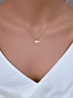 "Tiny Gold Cross Necklace God Bless Necklace is made with 14k Gold fill or Sterling silver Shiny surface. Use for everyday and comfort wearing... Petite and light weight . It consists of .. -4.3 x 7.3mm 14k gold fill or Sterling silver Tiny Cross pendent, -7mm Gold fill or Sterling silver initial charm, -14k gold fill chain or Sterling silver chain 14\", 16\" or 18\" end to end spring claw. it come with small ribbon gift box and care package . It could be sterling silver as well. MORE CROSS http Simple Tiny Initial Pendant Charm Necklaces, Simple Tiny Initial Pendant Charm Necklace, Simple Charm Necklace For Anniversary, Simple Tiny Initial Pendant Jewelry, Simple Tiny Initial Pendant Necklace, Simple 14k Gold Initial Pendant Charm Necklaces, Simple 14k Gold Initial Pendant Charm Necklace, Cross Pendent, Tiny Cross Necklace