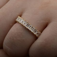 Real Baguette Diamond Full Eternity Band Ring Solid 14K Yellow Gold Fashion Fine Party Wear Jewelry Gift For Her * SKU: SR01032 * Made to Order * Gold Purity: 14K Solid Yellow Gold (stamped) * Custom Gold Color: Rose Gold, Yellow Gold, White Gold * Custom Gold Purity: 9K/14K/18K (Charges Apply) * Baguette Diamond Weight: 2.10 ct. Product Measurement:- Ring Size: 2 to 10 (All sizes available) ✦ Size can be customized as per your request, please mention the required size in buyer notes (Charges ma Gold Eternity Band With Baguette Diamonds, Gift Emerald Cut Eternity Band With Baguette Diamonds, Emerald Cut Eternity Band With Baguette Diamonds, Gift Emerald Cut Baguette Diamond Eternity Band, White Baguette Cut Eternity Band As Gift, Gold Eternity Band With Prong Setting Baguette Cut, Gold Baguette Cut Eternity Band With Prong Setting, Gold Baguette Diamond Wedding Ring With Emerald Cut, Emerald Cut Eternity Band With Baguette Diamonds For Wedding