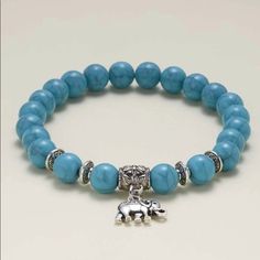 Turquoise Stone Is The One That Align And Balance The Chakra It’s Known To Dispel Negative Energy This Bracelet Has A Elephant Charm For Good Luck Its Made With Elastic Clear String To Stretch Perfect For A Gift To Someone Special Casual Turquoise Bracelet Jewelry, Casual Turquoise Bracelet, Turquoise Beaded Charm Bracelet For Gift, Turquoise Beaded Charm Bracelet Gift, Casual Turquoise Jewelry With Gemstone Beads, Bohemian Light Blue Bracelets For Jewelry Making, Elegant Turquoise Adjustable Charm Bracelet, Bohemian Light Blue Bracelet, Bohemian Adjustable Turquoise Charm Bracelet