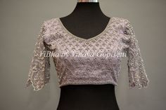 Expertly crafted Pastel Lavender Net Blouse, adorned with intricate Silver Zari and dazzling Crystal embroidery. Delicately designed for a feminine touch, this blouse is perfect for adding a touch of elegance to any outfit. Elevate your style with this stunning piece. Silver Net Blouse Designs, Silver Netted Blouse Designs, Lavender Net Blouse Design, Festive Bollywood Lavender Blouse Piece, Lavender Blouse Design, Latest Bridal Blouse Designs, Net Blouse, Pastel Lavender, Net Blouses