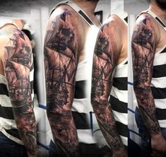 a man with a full sleeve tattoo on his arm