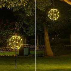 two lights that are hanging from trees in the yard at night, one is lit up and the other is turned on