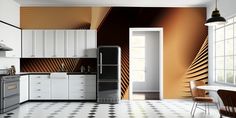 a kitchen with white cabinets and an orange wallpaper on the back splashing from the door