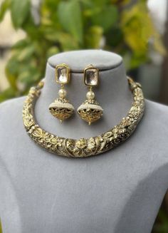 Beautiful Sabyasachi Inspired designer Antique Two Tone Hasli Necklace with matching kundan earrings. The Hasli has Adjustable  Dori  The Earrings Have pushbacks Handmade Highest quality and craftsmanship Customized orders takes 3 to 4 weeks, depending on piece requirements. The Ombre Designs Jewelry pieces can be customized in accordance with your requirement. Please Email or Whats app on : +91 8448833193 / sonalikamehra [!at] theombredesigns.com Sabyasachi Inspired Jewelry, Real Gold Jewelry Indian, Hansli Necklace Gold, Gold Hasli Designs, Hasli Designs, Hasli Necklace Gold, Sabyasachi Earrings, Hasli Necklace, Antique Necklace Gold