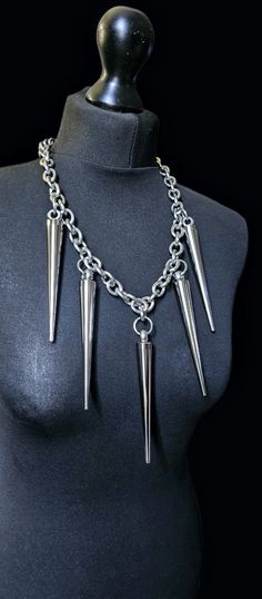 Goth punk / rock style huge 150mm aluminium cone spike necklace . Comes with 18 inches heavy duty stainless Steel chain . Lead and nickel free  SHIPPING BY INTERNATIONAL AIRMAIL - DOES NOT PROVIDE TRACKING  I ship orders in the order they are received and according to requests (processing time may vary depending on work volume)  shipping times (times vary)  Usually 2-3 working days for UK destinations .5-7 working days to European destinations; usually 7-12 working days worldwide. VERY IMPORTANT Rocker Style Metal Jewelry For Festival, Silver Spiked Jewelry For Alternative Fashion, Alternative Fashion Silver Spiked Jewelry, Metal Spiked Jewelry For Concerts, Silver Rocker Jewelry With Spikes, Punk Rock Style, Goth Necklace, Spike Necklace, Uk Destinations