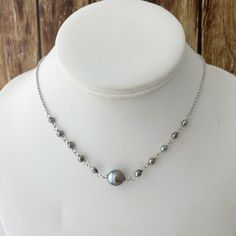 "Looking for something unique and different? This beautiful necklace displays a nice and small Tahitian Pearl paired with small and dainty tahitian keshis pearls . ✨This Listing is for Sterling Silver. For the Gold-filled necklace is click on the following link: Length : 17-18\" if you need a different size please specify at checkout . There is an extender on the back to make it more versatile and can be adjusted slightly about 1\" . Description ✨Tahitian pearls: Size : 8-9mm small and dainty si Tahitian Pearls Jewelry, Necklace Displays, Tahitian Pearl Pendant, Tahitian Pearl Necklace, Tahitian Black Pearls, Big Pearl, Pearl Choker Necklace, Tahitian Pearls, Pearl Choker