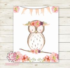 an owl is sitting on a branch with pink flowers and bunting around its neck