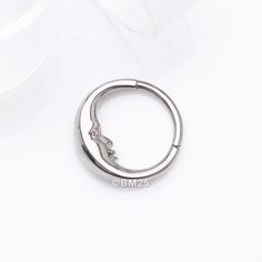 All of our Titanium Jewelry are made with Mirror Polished Ti-6AL-4V-ELI ASTM F136 Implant Grade Titanium. Add a touch of celestial charm to your piercings with our Implant Grade Titanium Vintage Crescent Moon Face Clicker Hoop Ring. Made from high-quality titanium, this unique piece features a vintage crescent moon design for a stylish and one-of-a-kind look. Perfect for showing off your playful and quirky personality. * Material: Implant Grade Titanium * Size: 16 GA (1.2mm), 3/8" (10mm) * ASTM Piercings Smiley, Vintage Crescent Moon, Oral Piercings, Crescent Moon Face, Piercings Eyebrow, Crescent Moon Design, Piercings Cartilage, Heavy Sweating, Septum Piercings