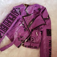 This Brand New Jacket Has Never Been Worn It Has A Lot Of Cool Patches Studad's Phrases Top Quality Made By For Her. Size Mediumpurple Studs Studded On Leather Very Nice Quality Jacket Medium Weight One Of A Kind Always Willing To Make A Deal Hit Me Up And Don't Miss Out On This Nice Jacket Fitted Spring Outerwear With Rivets, Trendy Winter Biker Jacket With Rivets, Trendy Fitted Biker Jacket With Rivets, Casual Biker Jacket With Rivets For Spring, Casual Spring Biker Jacket With Rivets, Trendy Fitted Outerwear With Rivets, Spring Biker Jacket With Rivets, Trendy Streetwear Outerwear With Rivets, Trendy Outerwear With Rivets For Streetwear