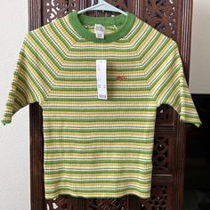 Nwt. Urban Outfitters 70’s Style Green Stripped Ribbed T Shirt. Size Med. Top- Bottom 19 Inches Pit-Pit 13 Inches Ribbed T Shirt, 70’s Style, Ribbed Tank, Green Tops, Urban Outfitters Tops, Infant Tees, Urban Outfitters, Womens Tops, Tops & Tees