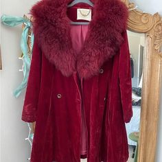 Vintage Faux Fur Beautiful Coat. It's So Cool! Fits Up To Around A Size 8/10 70s Coat Red Fur Coat With Faux Fur Trim For Winter, Red Fur Coat With Faux Fur Trim For Fall, Red Winter Fur Coat With Faux Fur Trim, Winter Red Fur Coat With Faux Fur Trim, Red Long Sleeve Fur Coat For Winter, Vintage Long Coat For Party, Retro Burgundy Long Sleeve Outerwear, Winter Party Burgundy Blazer, Red Faux Fur-lined Outerwear For Fall