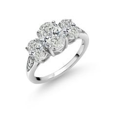 three stone diamond ring in white gold