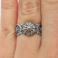 Great vintage condition.  925 Sterling Silver Vintage Filigree Floral Dome Ring Size 6.25  Weight: 2.6g   WELCOME TO PAWN SHOP We are an actual pawn shop and have been in business for over 25 years. Since 1990, our establishment has been serving a variety of clients by providing them with short term cash solutions and options of liquidity regarding their treasured heirlooms. Acknowledging that today′s customers are very sophisticated and are looking for a variety of investments, our acquisitions are hand-picked for our special clientele. We do offer the most interesting items along with affordable prices. We do not disturb our vintage jewelry in order to keep its original patina leaving it to your discretion. Depending on your own taste, you can either polish it or keep it in the same cond Antique Stamped Sterling Silver Rings, Silver Antique Stamped Rings, Vintage Filigree Ring With Oxidized Finish For Anniversary, Victorian Silver Engraved Hallmarked Ring, Vintage Oxidized Filigree Ring For Anniversary, Victorian Style Silver Engraved Hallmarked Ring, Vintage Sterling Silver Engraved Toe Ring, Ornate Oxidized Filigree Ring For Anniversary, Vintage Silver Toe Ring With Flower Design