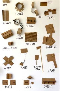 the instructions for making cardboard boxes with scissors and tape on them, including strips of construction paper