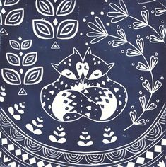 a blue and white plate with an owl on it