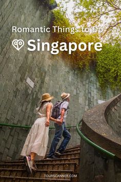 two people walking up some stairs with the words romantic things to do in singapore