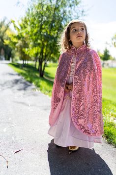 The right cloak can help finish the look and make any dress up more dazzling and this Gold Shimmer Cloak is sure to help you complete the look! Ages 3-8 Made from a shimmering pink sequin fabric and lined with a pink china silk Quality hook and loop closure, easy on - easy off Breathable, Silky Soft, 100% Polyester Fabrics Dress Ups & Accessories Sold Separately Pink Sparkly Sequin Dress For Dress-up, Pink Glitter Sequin Dress For Dress-up, Pink Sequin Dress For Dress-up, Pink China, Pink Sequin, Sequin Fabric, Gold Shimmer, Hook And Loop, Cloak