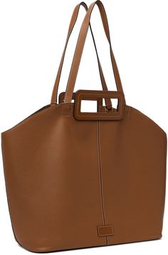 Grained leather tote in tan. · Twin carry handles and shoulder straps · Logo patch at face · Lobster clasp at interior · Detachable zip pouch at interior · Suede lining · Contrast stitching in white · H13 x W22.5 x D6 Supplier color: Tan Cognac Calf Leather Bag With Handles, Brown Calf Leather Bag With Handles, Chic Staud Shoulder Bag With Leather Handles, Staud Shoulder Bag With Leather Handles, Staud Tote Shoulder Bag For Travel, Staud Leather Shoulder Bag For Shopping, Brown Calf Leather Shoulder Bag With Handles, Staud Tote Shoulder Bag For Everyday, Staud Shoulder Bag With Leather Handles For Everyday