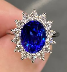 ALL THESE PHOTOS WERE TAKEN WITH AN ORDINARY IPHONE & HAVE NOT BEEN EDITED OR ENHANCED IN ANY WAY. VIDEO LINKS: Up For Sale is an Incredible Natural Royal Blue Ceylon Sapphire & Diamond Halo Ring in Solid Platinum. This Ring was made by us Here in New York City & is of the Finest Quality. The Center Stone is a Gorgeous Natural GIA Certified 5.05 Ct Royal Blue Sapphire that Measures Approximately 10.7 x 8.3 mm & was Mined in Ceylon (Sri Lanka.) It Has Fantastic Color a Super Rich Royal Blue Hue w Luxury Antique Oval Sapphire Ring, Luxury Exquisite Sapphire Ring With Diamonds, Luxury Exquisite Sapphire Ring With Halo Setting, Luxury Dazzling Platinum Sapphire Ring, Luxury Dazzling Sapphire Gemstones, Luxury Gold Sapphire Ring Collectible, Luxury Royal Blue Sapphire Ring, Luxury Gia Certified Lab-created Sapphire Jewelry, Lab-created Sapphire Ring With Vvs Clarity