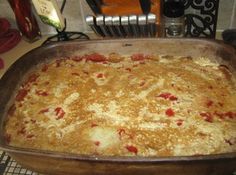 a casserole dish sitting on top of a stove