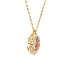 Embrace the enchanting beauty of our morganite necklace and let its timeless elegance captivate your heart. At the center of this captivating necklace is a mesmerizing oval-cut morganite gemstone, radiating a soft and enchanting blush hue. Its elongated shape adds a touch of elegance and creates a sense of movement, capturing the essence of timeless beauty. Above and below the main stone, a delicate row of sparkling white gemstones gracefully accentuates the allure of the morganite. The shimmeri Elegant Oval Pendant Necklace With Birthstone, Exquisite Gold Morganite Jewelry, Elegant Rose Gold Crystal Necklace With Round Pendant, Elegant Oval Pendant Birthstone Necklace, Elegant Oval Crystal Necklaces, Elegant Oval Pendant Crystal Necklace For Gift, Elegant Pink Oval Pendant Necklace, Elegant Oval Crystal Necklace, Elegant Pink Pendant Birthstone Necklace