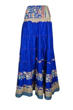 Embrace your free-spirited side with our Navy Blue Floral Boho Chic 2 in 1, Maxi Skirt Dress designed for the modern soul who loves to blend comfort and style. This flowing, maxi-length skirt features floral prints and earthy tones, perfect for creating a laid-back yet hippie-style look. Handcrafted with care, the skirt boasts tiered layers, ruched waist that can be pulled up as a strapless dress and subtle, giving it a graceful, gypsy flair. Whether you're strolling on the beach or attending a Ankle-length Maxi Skirt For Beach, Beach Ankle-length Maxi Skirt, Flowy Blue Skirt For The Beach, Ankle-length Maxi Skirt For Vacation, Bohemian Beach Maxi Dress With Lined Skirt, Bohemian Maxi Dress With Lined Skirt For The Beach, Blue Flowy Tiered Maxi Skirt, Bohemian Blue Maxi Skirt For Beach, Bohemian Dresses With Lined Skirt For Vacation