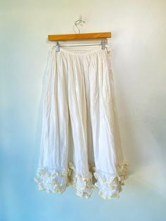 Vintage Bureaux White Ruffle Skirt! So cute! 100% cotton. Fully lined. Best fit a S/M, please refer to measurements. In overall good condition with some signs of wear throughout, and a small hole on the side. Approx. Measurements: Waist: 30" Length: 30" Cotton Tiered Skirt For Daywear, Cotton Gathered Skirt Bottoms, Full Cotton Skirt With Lining, Cotton Full Skirt With Lining, Cotton Full Skirt With Elastic Waistband, Cotton Lined Flared Skirt, Cotton Lined Flowy Skirt, Flowy Cotton Lined Skirt, Cotton Flared Skirt With Lining