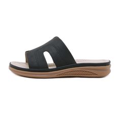 Walk with comfort and style in our Siketu Off the Coast Cushioned Flat Sandals. The perfect blend of fashion and practicality, these sandals provide cushioned support for your feet while boasting a trendy coastal look. Available in apricot, add a touch of whimsy to your summer wardrobe. Cheers to happy feet! 0.98'' heel Slip-on PU upper Synthetic Arch support footbed™ Cushioned Insole™ Anti-skid rubber sole Black Flat Sandals With Arch Support, Casual Black Slippers With Arch Support, Comfortable Black Slide Wedge Sandals, Black Comfortable Slide Wedge Sandals, Comfortable Black Sandals For Beach, Comfortable Black Sandals With Textured Footbed, Black Lightweight Sport Sandals With Cushioned Footbed, Lightweight Black Sandals For The Beach, Lightweight Black Sport Sandals With Cushioned Footbed