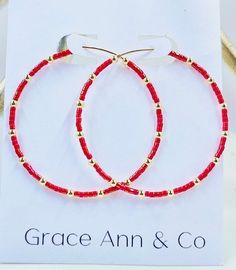 Dainty yet bold, these seed bead hoops are the kind of earrings you'll forget you're wearing - until the next compliment is made, that is.Red miyuki seed beads and 2.5 gold filled beads are hand threaded onto a 14k gold filled 45 mm hoop in a fun-loving design that you'll reach for time and time again. These earrings are hypoallergenic and will not tarnish! Perfect for Alabama, Arkansas game day or any occasion!!  Xoxo,  Shelly Cheap Red Hoop Earrings With Colorful Beads, Adjustable Hoop Earrings With Gold Beads As Gift, Adjustable Gold Beads Hoop Earrings As Gift, Adjustable Gold Beaded Hoop Earrings As Gift, Beaded 14k Gold Filled Hoop Earrings, Gold Hoop Earrings With Tiny Beads For Summer, Red Hoop Jewelry For Festive Occasions, Festive Red Hoop Jewelry, Nickel Free Red Hoop Earrings