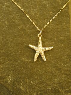 "This solid 3 Dimensional Sea Star is 14K Gold. To make this piece I made a temporary mold off a tiny dried sea star, then made an original that I made a permanent mold from. This sea star has all the details of the sea star that I started from. The included chain is a 14K Gold chain. You may chose 16, 18 or 20 inch at the same price. Other length available at sightly higher prices. The Sea Star pendant measures 7/8\" tall by 3/4\" across. I hand cast all my pieces using the lost wax casting met Sea Star Necklace, Dinosaur Pendant, Sea Necklace, Pretty Jewelry Necklaces, Sea Star, Beads Bracelet Design, Funky Jewelry, Jewelry Lookbook, Star Pendant