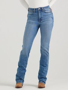 EVERY COWGIRL’S GO-TO Trends may come and go, but the bootcut is forever. Our Women’s Wrangler Retro® Bailey High Rise Bootcut Jean sets the bar high with a waist-nipping silhouette, a close fit through the thigh, and a slightly flared 17” leg opening that goes perfectly over boots. It’s crafted from cotton with just a subtle amount of stretch for comfort. Plus, the signature five-pocket styling, “W” stitching, and rope logo patch deliver the Western authenticity you want. Best Bootcut Jeans For Women, Tall Jeans For Women, Style Bootcut Jeans, Wrangler Jeans Women's, Wrangler Women, High Rise Bootcut Jeans, Work Jeans, Bke Jeans, Bootcut Jean