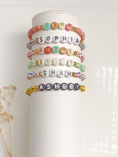 🍀 Design Your Own Bracelet ☀️ Wear your bracelet alone or stack it with others. Make it even more special by adding the name or a memorable date of a loved one. ✨ Choose Your Word/Numbers. ✨ You can personalize your bracelet with up to 12 letters of your choice. ✨ The bracelet is made with a flexible cord, so please handle it carefully when putting it on. ✨ I can create the bracelet in your desired size. Just send me a message, or you will receive a standard size (6 inches). ☀️ All my jewelry i Bracelets Beaded, Custom Bracelet, Bracelet Bead, Bracelet Beaded, Name Bracelet, Personalized Bracelets, Custom Bracelets, Bulk Order, Gift Handmade