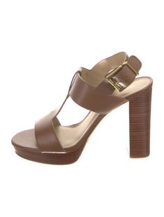 Michael Kors Leather T-Strap SandalsBrownPlatformStraps & Buckle Closure at AnklesUnfortunately, due to restrictions, this item may not be eligible for shipping in all areas. Brown T-strap Sandals With Ankle Strap, Brown T-strap Heels With Heel Strap, Brown Leather T-strap Heels, Brown T-strap Heels With Buckle Closure, Elegant Brown T-strap Sandals With Buckle Closure, Formal Brown T-strap Sandals With Heel Strap, Brown Strappy T-strap Sandals With Buckle Closure, Chic Brown T-strap Heels, Elegant Brown T-strap Sandals For Summer