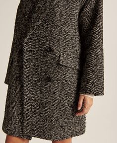 Our new double-breasted coat in a wool-blend fabric and oversized, drop-shoulder fit, that's roomy through the sleeves. Features a legging-friendly length, front pockets, on-trend oversized collar and lapel and cozy interior lining. Imported. Shell:59% Polyester, 32% Wool, 5% Acrylic, 2% Viscose, 2% Nylon • Do not wash • Do not bleach • Do not tumble dry • Do not iron • Dry clean Wool Texture, Herringbone Coat, Textured Coat, Black Herringbone, Wool Textures, Black Wool Coat, Oversized Collar, Cozy Interior, Double Breasted Coat