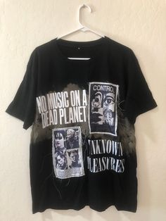 Size: XL: Unisex T-Shirt. Cotton & Hand Printed  Measurements :  XL Size:  Top to Bottom (28-29 inches) Across Armpits (22-23 inches) Shipping :  We ship worldwide from Bangkok, Thailand.  Shipping will take around 2-4 weeks.  We ship with registered # for confirmation of delivery.  Returns: Returns welcome within 7 days of receiving your item. Punk Style Short Sleeve T-shirt With Graffiti Print, Edgy Relaxed Fit Graffiti Print T-shirt, Edgy Distressed Crew Neck T-shirt, Grunge Short Sleeve T-shirt For Concert, Unisex Punk T-shirt With Letter Print, Rock Style T-shirt With Letter Print And Short Sleeves, Alternative Style Graphic T-shirt With Short Sleeves, Crew Neck Graphic Print Top, Crew Neck Graphic Print Top For Concert