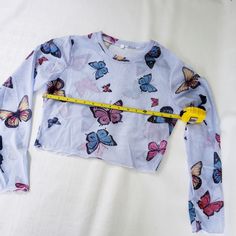 See Through Top Cute Kawaii Harajuku Alternative Pink Or Blue Butterflies New M/L Measures : 32-38 Bust 16 Inch Length Trendy Butterfly Top For Spring, Trendy Butterfly Shaped Tops For Spring, Trendy Butterfly-shaped Top For Spring, Trendy Butterfly-shaped Tops For Spring, Spring Butterfly Print Long Sleeve Tops, Spring Long Sleeve Tops With Butterfly Print, Fitted Long Sleeve Tops With Butterfly Print, Spring Long-sleeve Tops With Butterfly Print, Fitted Butterfly Print Tops For Spring