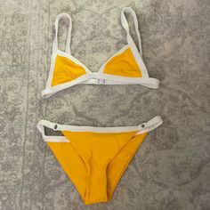 New With Tags. It 44. Uk 12. Yellow Triangle Top Swimwear With Stretch, Fitted Yellow Swimwear For Beach Season, Fitted Neon Yellow Triangle Top Swimwear, Neon Yellow Fitted Triangle Top Swimwear, Yellow Color Block Swimwear For The Pool, Yellow Color Block Swimwear For Poolside, Yellow Color Block Swimwear For Pool, Yellow Color Block Swimwear For Swimming, Mustard Swimwear For Summer Poolside