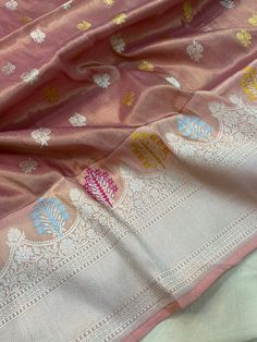 This is a very beautiful Pure banarasi katan tissue silk handloom saree Kadhyal weave border, Sona Rupa weave booties, golden n silver zari, paithani tilffi border, with  blouse piece.  Saree length - 5.5 mtr. Blouse - 1 mtr.  Dry clean only . Please note - color may be vary a little due to sunlight and photography . Please message us after purchasing in case you want fall and Pico done it not . No extra charges for fall and Pico but inform us . Blouse stitching is also available . Festive Banarasi Silk Saree, Handloom Saree For Festivals, Handloom Saree For Festivals And Gifts, Festive Handloom Saree As Gift, Festive Handloom Dupatta As Gift, Festive Handloom Dupatta For Gifts, Festive Handloom Dupatta Gift, Traditional Saree With Cutdana For Gift, Pink Meenakari Katan Silk Saree