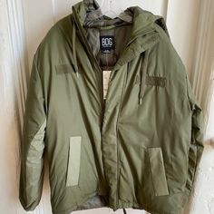 Never Worn Bdg Urban Outfitters Hooded Parka Winter Jacket Olive Color Mens Us Size L. Front Zip With Velcro Flap Closures And Drawstring Waist. Slash Front Pockets Underarm To Underarm 24". Shoulder To Shoulder 22". Underarm To Hem 18" Super Cozy And Warm! Urban Outfitters Winter Streetwear Outerwear, Winter Combat Cotton Outerwear, Military Style Outerwear With Adjustable Hood For Streetwear, Military Outerwear With Fleece Lining For Streetwear, Military Style Outerwear With Fleece Lining For Streetwear, Khaki Puffer Jacket With Pockets For Streetwear, Green Combat Hooded Outerwear, Green Hooded Combat Outerwear, Green Combat Style Winter Outerwear