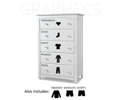 a white dresser with five drawers and four shirts on it