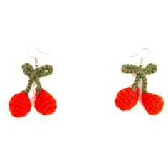 Add a touch of playful elegance to your accessory collection with our Cherry Handmade Knit Earrings in Red. These unique earrings are crafted with meticulous attention to detail, combining artisanal craftsmanship with a whimsical design that is sure to turn heads.  Each pair of earrings is handmade, featuring intricately knitted cherry motifs in vibrant red yarn.  The Cherry Handmade Knit Earrings are designed with high-quality materials, ensuring durability and a beautiful finish. The hooks are crafted from hypoallergenic metal, making them suitable for sensitive ears. These earrings make a delightful gift for yourself or a loved one, bringing a pop of color and a dash of whimsy to any jewelry collection.  12841002 35% Polyamide - 65% Acrylic