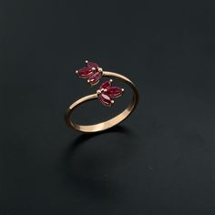 Ruby Bypass Ring * Rose Gold Dainty Ruby Ring * July Birthstone Ring * Minimalist Ruby Ring * Open Band Leaf Ruby Ring * Marquise Cut Ruby Product Features: *MODEL CODE: DZD2031 *METAL: GOLD *RUBY STONE: 0.53CT *COLOUR F-G *CLARITY: VS-SI *GRAM: 1,90 GR **The product will be sent with it's certificate. Awesome gift for yourself, friends or family members *PACKING & GIFTS Each product is packed in our beautiful Diaz Jewelry presentation box and includes, certificate, and an appraisal card. *FREE Dainty Rose Gold Butterfly Open Ring, Rose Gold Open Ruby Ring For Promise, Open Ruby Ring In Rose Gold As Gift, Rose Gold Open Butterfly Ring, Dainty Ruby Ring, Jewelry Presentation, July Birthstone Ring, Ring Marquise, Bypass Ring