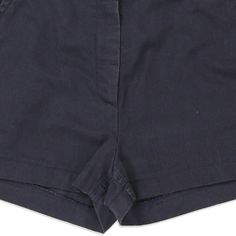 Description:Vintage Calvin Klein navy shorts, fit a UK size 8 - mid rise with a 28" waist. Size conversion: US Size: 4EU Size: 36IT Size: 40 RISE TYPE: Mid RiseWAIST: 28 inches / 71cmsINSEAM: 2 inches / 5cmsRISE: 10 inches / 25cmsGENDER: womens CONDITION: very good.STYLE: shortsERA: 1990sCOLOUR: navyFABRIC: cotton Navy Cotton Shorts With Short Leg, Navy Bermuda Shorts For Summer, Navy Shorts With Pockets, Classic Navy Summer Bottoms, Classic High Waist Cotton Shorts, Navy High-waisted Shorts For Spring, Navy High Waist Casual Shorts, Casual Navy High Waist Shorts, Classic Navy Bottoms, Short Length