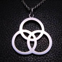 This is a Sterling silver pendant based on Bonzo's symbol used on the Led Zeppelin IV album. The pendant is 30mm across at the bottom. Comes with a... Led Zeppelin Iv, Artisan Jewelry Necklaces, John Bonham, Handcrafted Artisan Jewelry, Led Zeppelin, Zeppelin, Sterling Silver Pendant, Artisan Jewelry, Sterling Silver Chains