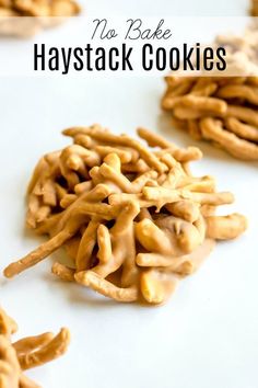 cookies with peanut butter and pretzels in the middle on a white table top