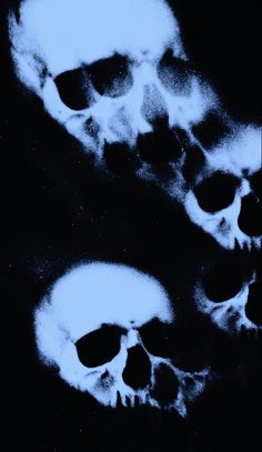 three skulls are shown in blue and black