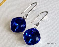 Wedding Majestic Blue Sapphire Royal Cobalt Blue Colored Crystal Silver Dangle Bridal Bridesmaids Earrings. PLEASE READ ITEM DESCRIPTION and SHOP POLICIES before placing your order, and contact me with any questions! EARRINGS are about 1.18 inch (3cm) long from top of earring wire to bottom. MATCHING NECKLACE: https://www.etsy.com/listing/662538760/blue-crystal-charm-necklace-royal-blue?click_key=1d0a712ac1d5c6c68b4168173e27ed3192c406e2%3A662538760&click_sum=489927c7&ref=shop_home_active_20&cns= Royal Blue Silver Wedding, Blue Silver Wedding, Blue Silver Weddings, Necklace Royal, Blue Bridal Earrings, Blue Wedding Jewelry, Blue Sapphire Jewelry, Earrings Sapphire, Bridesmaids Earrings