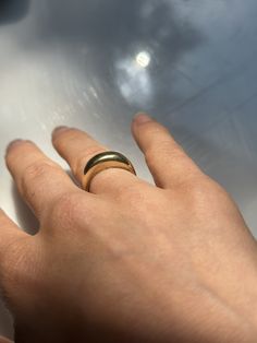 This design stemmed from my love of simple buttery gold bands, but wanting a little extra funk. It's a gold band that can hold its own, or be part of a fun stack. This is made in a very hefty 18k or 14k yellow gold band, carved to be comfortable to wear while also making a statement. It took me many many iterations to get it to this point, and I'm excited to share it with you. Probably the heaviest ring you'll ever wear. It's dome ring inspired, but with a twist. All of my pieces are handmade by me. If you like this but want a tweak, or a different size, message me and let's talk! Stackable Thick Band Dome Ring For Everyday, Gold Stackable Rings With Thick Band For Everyday, Everyday Gold Wide Band Stackable Ring, Modern Gold Bands For Everyday, Modern Gold Bands For Everyday Wear, Gold Wide Band Everyday Ring, Gold Wide Band Stackable Rings For Everyday, Gold Stackable Wide Band Rings For Everyday, Everyday Gold Stackable Wide Band Rings