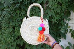 Lightweight Bag. Large Bag. Hand died palm leaf. Round Handel. Beach Bag. TASSEL SOLD SEPARATELY Diameter- 10 inches Height including handals- 15 inches Bohemian Fair Trade Bags For Festivals, Palm Leaf Bag, Surfer Kids, Lightweight Bag, Mexican Style, Leather Bags Handmade, Glitter Christmas, Market Bag, Palm Leaf